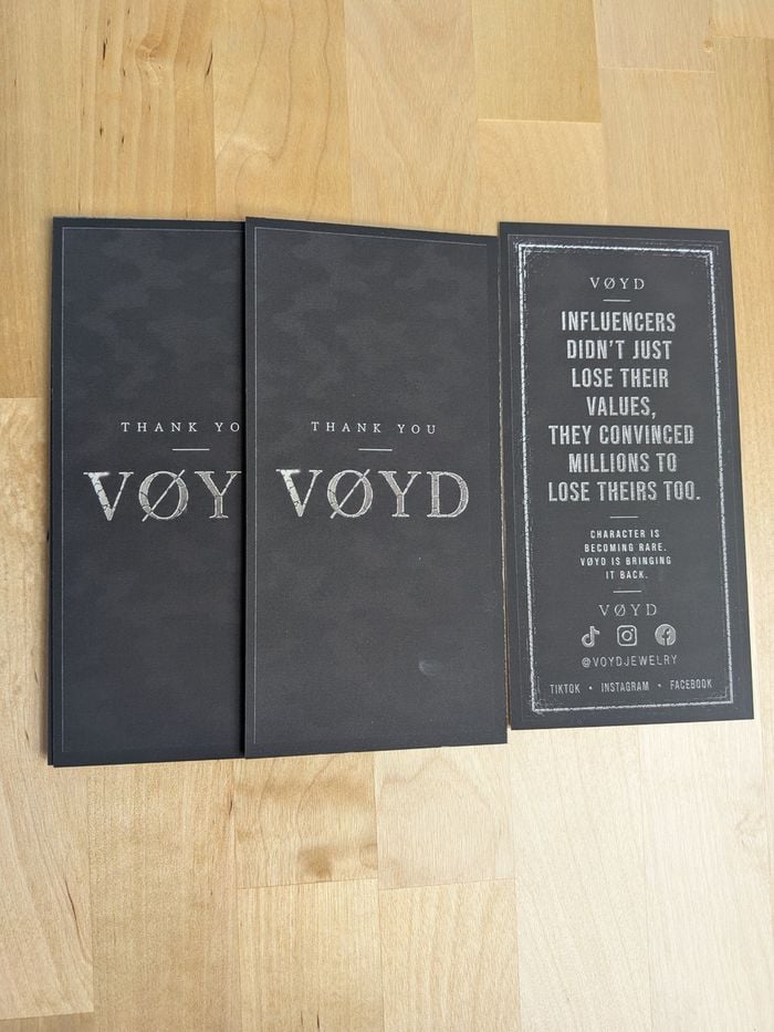 Silver foil and raised spot UV on soft-touch suede stock